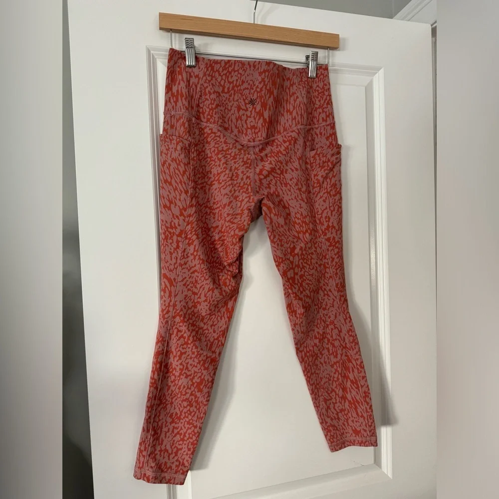 Athleta Salutation Stash Pocket II Printed 7/8 Tight Ocelot Spot Jewel Orange